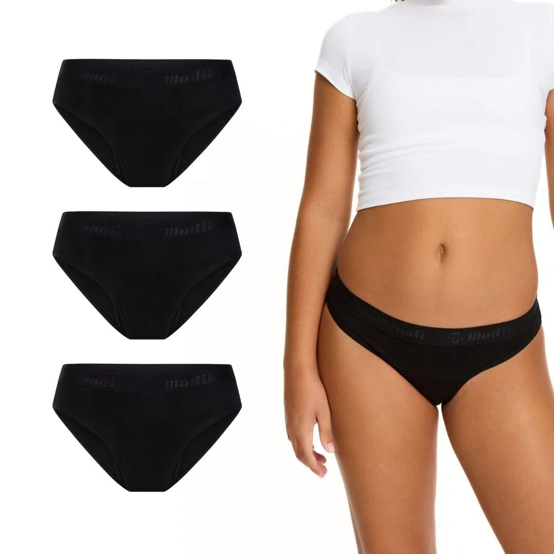 Modibodi Bragas Menstruales Niña Adolescente Hipster Bikini Flujo Medio 30ml Antifugas Reutilizable Ropa Interior Algodón Suave Cómoda Negro